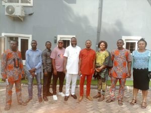 APGA state chairman flanked by some executives of the party after the meeting